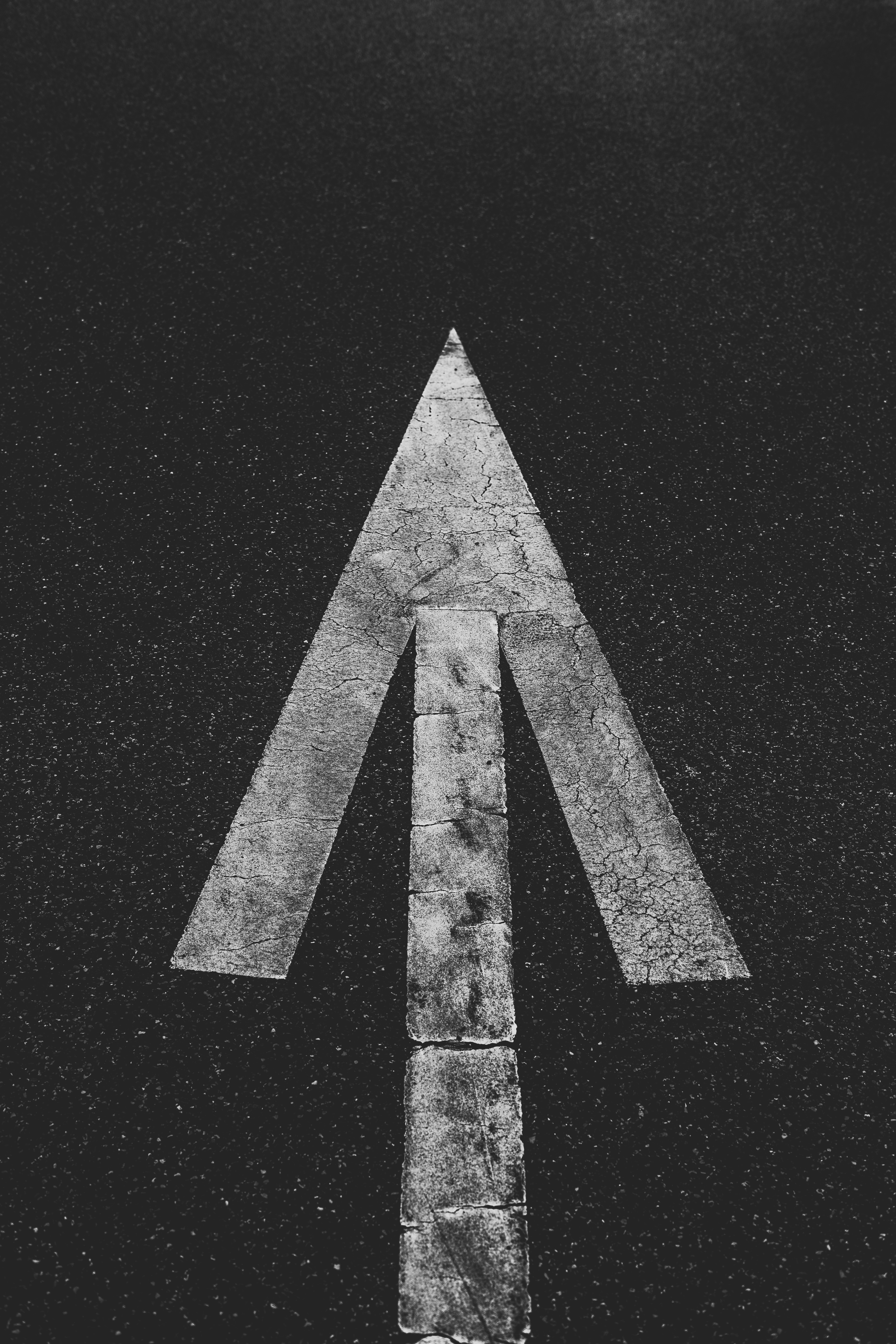 White arrow on the road